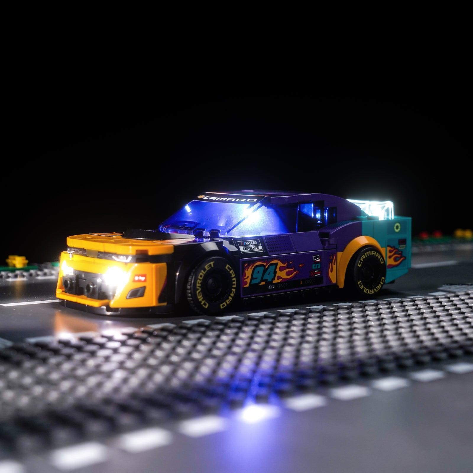 BrickBling's LEGO Speed Champions NASCAR® Next-Generation Chevrolet Camaro ZL1 76935 Lighting Kit turns your building experience into a dazzling feast, enhancing the sleek lines and dynamic features of the next-generation Chevrolet Camaro ZL1. This NASCAR toy model car features realistic features, including a rear spoiler, front grille, hood, headlights and wheels, as well as authentic Camaro, Cup Series and NASCAR logos, all of which highlight exquisite craftsmanship and forward-looking aesthetics. Our
