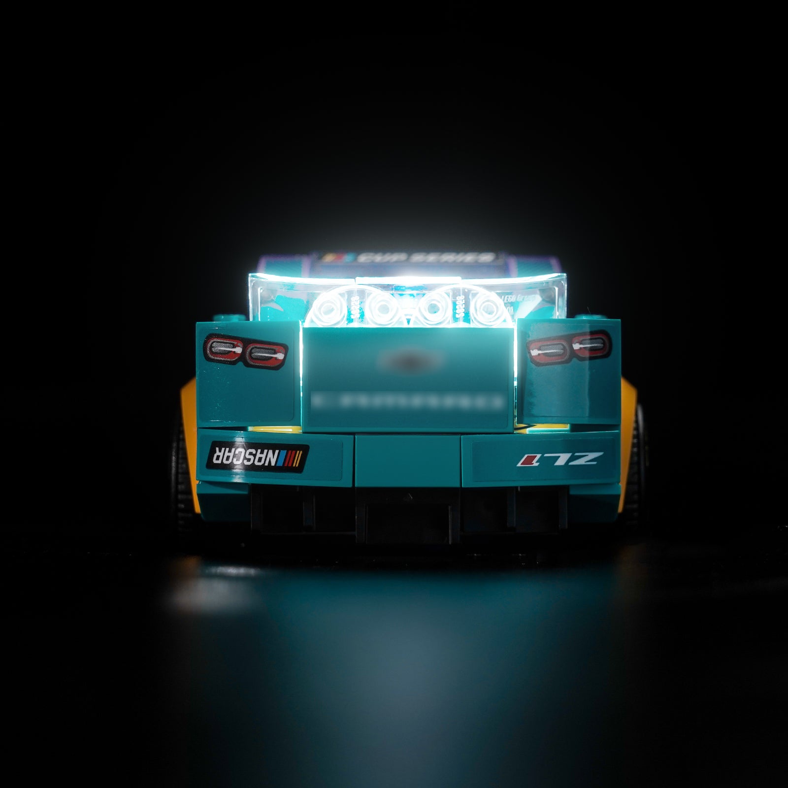 BrickBling's LEGO Speed Champions NASCAR® Next-Generation Chevrolet Camaro ZL1 76935 Lighting Kit turns your building experience into a dazzling feast, enhancing the sleek lines and dynamic features of the next-generation Chevrolet Camaro ZL1. This NASCAR toy model car features realistic features, including a rear spoiler, front grille, hood, headlights and wheels, as well as authentic Camaro, Cup Series and NASCAR logos, all of which highlight exquisite craftsmanship and forward-looking aesthetics. Our