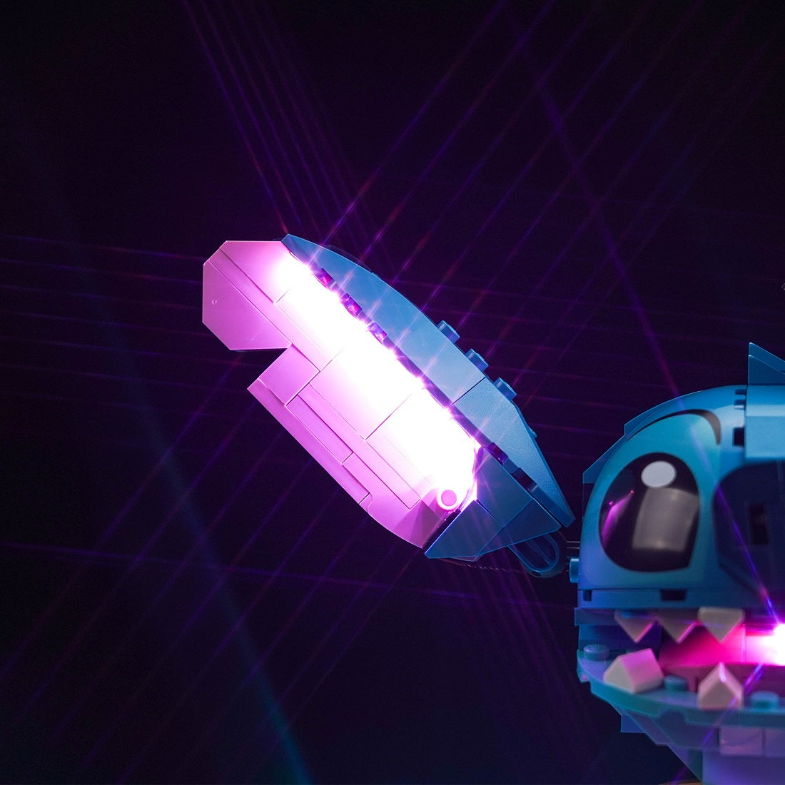 BrickBling custom light kit installed on LEGO Disney Stitch 43249 Big Ears for enhanced display