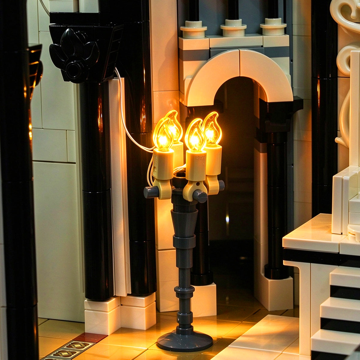 Flame LED lights installed around a LEGO medieval castle entrance